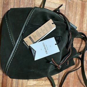 Suede army green leather backpack.